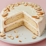 rachidamine a close up shot of a classic vanilla cake on a whit 551f4cc2 c616 4751 b0ed 67d53344ccfb