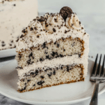 rachidamine a close up shot of a slice of cookies and cream cak 0c08af88 2c10 44ca 8231 ede6657e57be