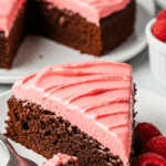 Chocolate cake with raspberry frosting served for elegant entertaining