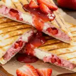 Strawberry cheesecake quesadillas served with strawberry dipping sauce