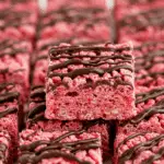 Chocolate covered cherry Rice Krispies treats served at party presentation