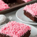 Hostess snowball cake served at party showing pink coconut-topped squares