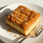 Plated upside-down apple bread square showing caramelized apple topping
